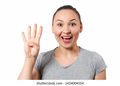 Beauty Holding Up Four Fingers, Portrait. On White Background