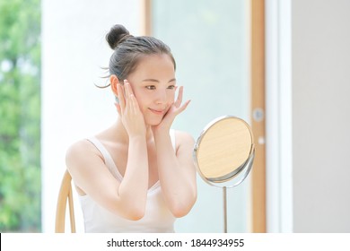 Beauty Image, Smiling Asian Woman With The Mirror