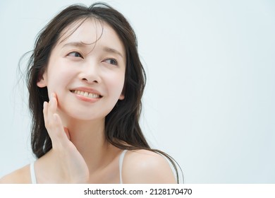 Beauty Image Of A Woman With Moist Skin