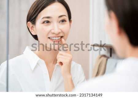 
Beauty image of a young woman doing oral care
