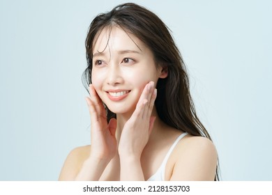 Beauty image of a young woman with good skin gloss - Shutterstock ID 2128153703