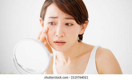 Beauty Image of young woman taking care of her skin