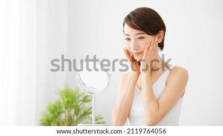 Beauty Image of young woman taking care of her skin
