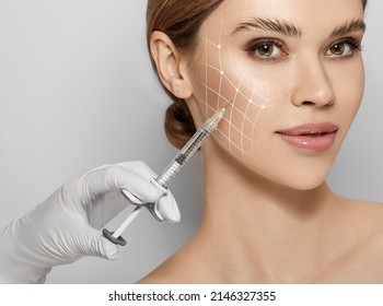 Beauty injections. Lifting lines on a woman's face showing of skin tightening and face contour correction with beauty injections in cosmetology - Shutterstock ID 2146327355