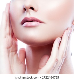 Beauty lips, part of face and hand of model girl. Clean skin, natural make-up
