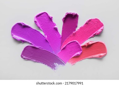 Beauty make up  Matt lipstick texture assortment colors  Gradient from violet to orange