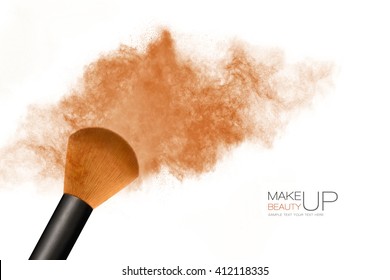 Beauty And Makeup Concept. Cosmetics Brush Releasing A Cloud Of Bronzing Face Powder Explosion Over A White Background With Copy Space For Text