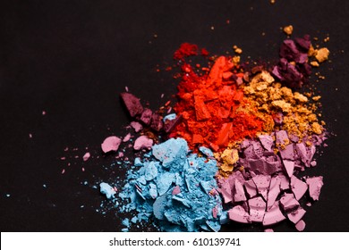 Beauty, Makeup Cosmetics. Eyeshadow Splash Palette, Colorful Crushed Eye Shadow Powder, Flat Lay, Top View, Black Background, Shallow Depth Of Field