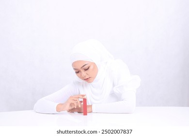 beauty makeup lips Young woman hijab beautiful elegant look lipstick hands embrace touch lipstick container isolated white background. cosmetic advertising concept, lip balm,lipstick container mock up - Powered by Shutterstock