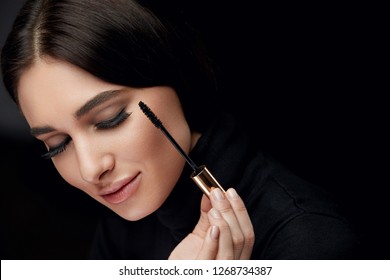 Beauty Makeup. Woman With Long Black Eyelashes And Mascara Brush