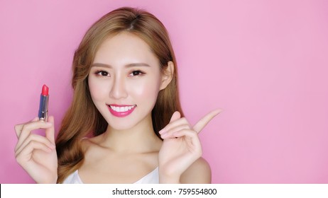 beauty makeup woman smile to you with lipstick and show something