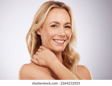 Beauty, mature woman and portrait of skincare, face wellness and self care in a studio. Isolated, white background and female model with smile from dermatology, spa and cosmetic treatment with mockup - Powered by Shutterstock