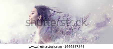 Beauty Model Girl with Lavender flowers double exposure art design. Beautiful young brunette woman with flying long hair profile portrait. Fantasy Watercolor. Nature cosmetics concept, make-up