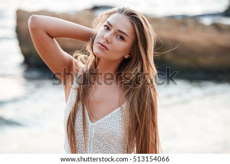 Beauty model on the beach. looking away. so pretty