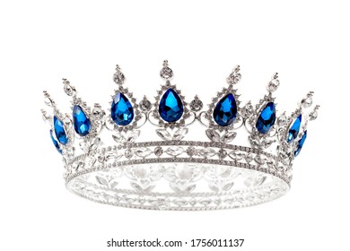 Beauty Pageant Winner, Bride Accessory In Wedding And Royal Crown For A Queen Concept With A Silver Tiara Covered Diamonds And Blue Sapphire Stones Isolated On White With Clipping Path Cutout