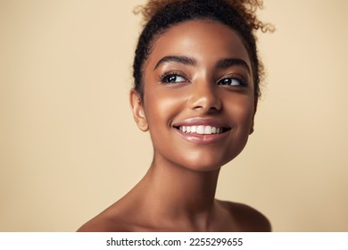 Beauty portrait of African American girl . Beautiful black woman touch her face . Facial  treatment . Cosmetology , skin care  and spa .  - Shutterstock ID 2255299655
