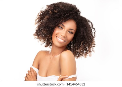 Beauty Portrait Of African American Woman With Clean Healthy Skin On White Background. Skin Care And Beauty Concept. Smiling Beautiful Afro Girl.