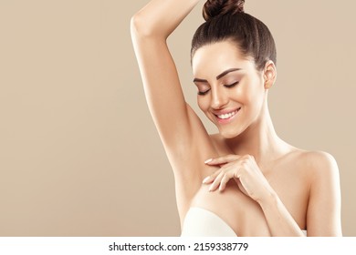 Beauty portrait. Armpit epilation, lacer hair removal. Young woman showing clean underarms. - Shutterstock ID 2159338779