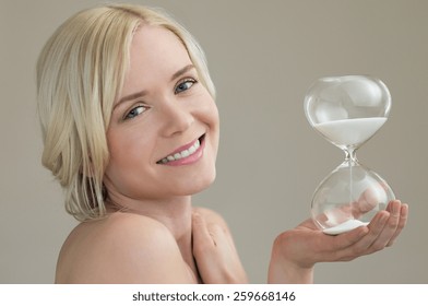 Beauty Portrait Of Beautiful Caucasian Woman Holding Hour Glass Sand Timer 