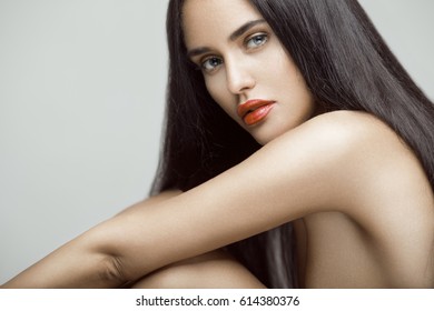 Beauty Portrait Of Beautiful Young Model Girl With Long Straight Hair. Professional Makeup.