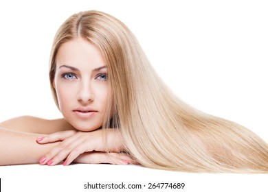 Beauty Portrait. Beautiful Young Woman With Long Blond Silky Hair Isolated Over White Background.