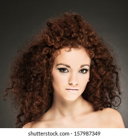 Beauty Portrait Of Curly Hair Woman With Smooth Makup