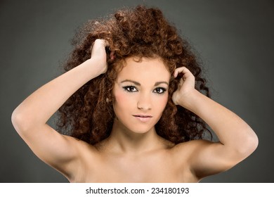 Beauty Portrait Of Curly Hair Woman With Smooth Makup