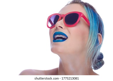 Beauty Portrait Of Fancy Caucasian Female With Silky Skin And Teeth Brackets Wearing Red Sunglases. Good For Dental Healthcare Products. Horizontal Image Orientation