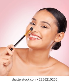 Beauty, portrait and happy woman with makeup brush in studio for cosmetic wellness on pink background. Smile, face and female model with tool for powder, contour and foundation, glamour or routine - Shutterstock ID 2356210255