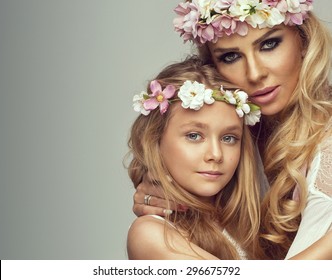 Beauty portrait of mother and daughter
