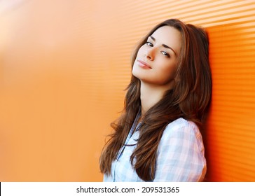 Beauty portrait pretty woman in the city summer near colorful wall - Shutterstock ID 209531365