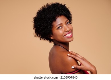 Beauty Portrait Of Smiling African Woman With Big Smile. Studio Shot. A Lot Of Copy Space.
