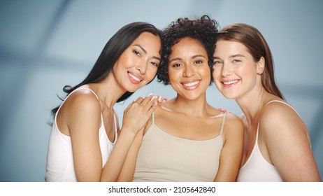 Beauty Portrait Of Three Diverse Multiethnic Models On Isolated Background. Beautiful Happy Asian, Black And Caucasian Women With Natural, Healthy Skin. Wellness, Spa, Cosmetology, Skincare Concept.