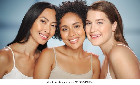 Beauty Portrait Of Three Diverse Multiethnic Models On Isolated Background. Beautiful Happy Asian, Black And Caucasian Women With Natural, Healthy Skin. Wellness, Spa, Cosmetology, Skincare Concept.