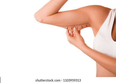 Beauty Portrait  Woman pinching Arm Fat Flabby Skin, Hand and Body Care. smooth skin                      