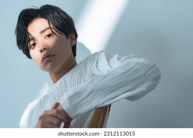 Beauty portrait of young Asian man with genderless makeup. Cosmetics and skin care concept. - Powered by Shutterstock