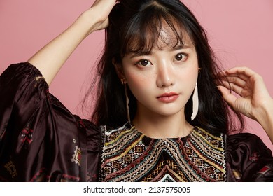 Beauty Portrait Of Young Asian Woman With Freckle Makeup On Pink Background