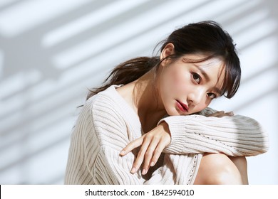 
Beauty portrait of young Asian women on light and shadow background - Shutterstock ID 1842594010