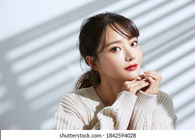 
Beauty portrait of young Asian women on light and shadow background - Shutterstock ID 1842594028