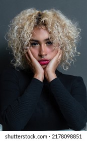 Beauty Portrait Of Young Hispanic Woman With Blonde Afro Hair