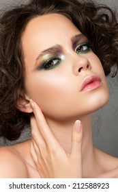 Beauty portrait young woman touching her face  catwalk beauty look