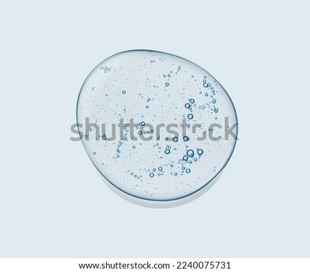 Beauty product. Gray blue serum or gel.Cosmetic texture isolated on white.