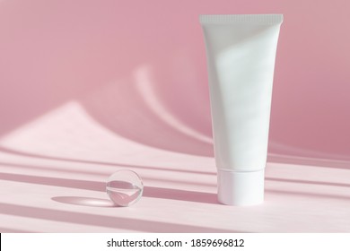 Beauty Product Mockup. Wellness Packaging. Branding Spa. Cosmetic On Pink Shadow Background. Cream Bottle, Lotion, Mousse, Cleanser, Shampoo For Skincare Routine. Copy Space