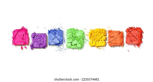 Beauty product rainbow colored eyeshadows for make up  objects isolated white background  banner  flat lay vivid colors crushed swatch eyeshade  close up cosmetic textures rainbow pallete  top view