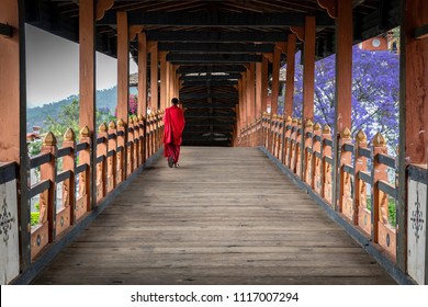 The beauty of Punakha Dzong is incomplete without its monks, drapped in red robe.
