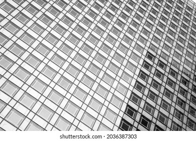 Beauty Of Rhythm. Skyscraper Modern City Architecture. Modern Building Architecture. Sky Reflects In Mirror Glass Windows. Architecture Concept. Business Centre. Abstract Background