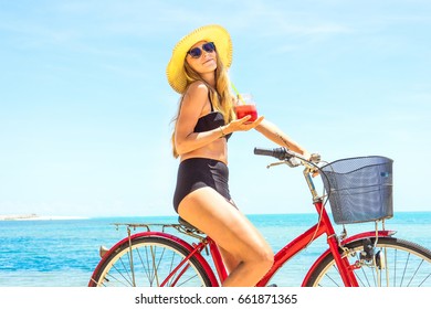 The Beauty Riding A Bicycle On The Beach At Sunset,the Stylish Girl By Her Bicycle, The Beach Cruiser Bicycle, A Road Bicycle Look Of Style,the Kind Stylish Woman In A Hat Sports,Thailand,island Samui