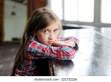 Beauty Sad Kid Girl Near The Classical Old Piano In The Retro Music Class