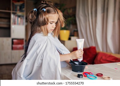Beauty salon at home  First hair dye experience  Girl power  Cute girl coloring hair and gradient effect by herself  online courses  stay at home concept for coronavirus emergency worldwide pandemic