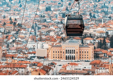 the beauty of Sarajevo's skyline from above as you journey through the cityscape in a cable car, passing over the rooftops and town hall. - Powered by Shutterstock